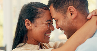 Face, dance and a happy couple embrace at home with love, care and romance. Young woman and a man laughing together in an apartment to hug and bond for happiness, quality time and commitment