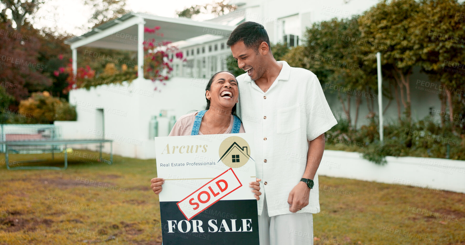 Buy stock photo Smile, hug and couple with sold sign, new home and future property investment together. Love, mortgage and real estate, excited man and happy woman in garden at house with opportunity in neighborhood