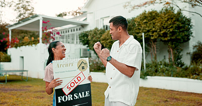 Property, high five and a homeowner couple with a sold sign in the garden of their new house together. Love, mortgage or real estate with a married man and woman in celebration of home ownership