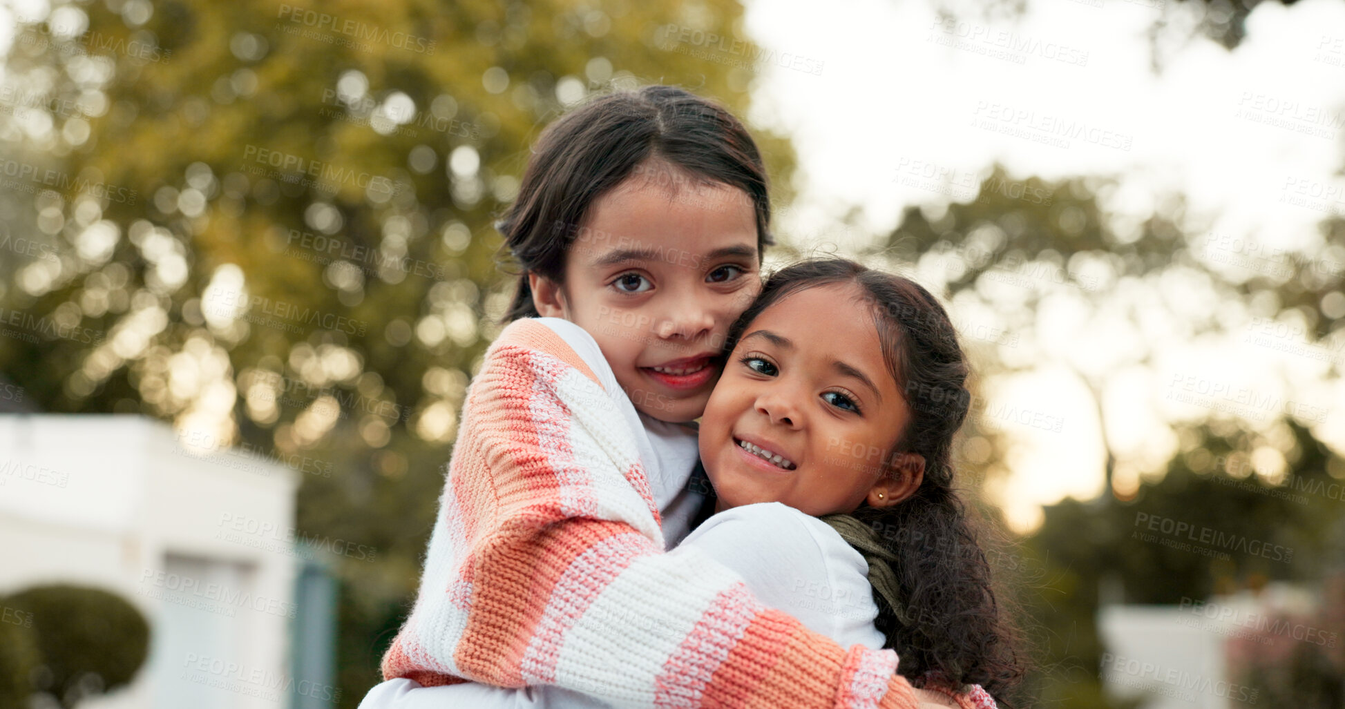 Buy stock photo Hug, face and sisters outdoor on summer break with smile from bonding, love and support of friends. Portrait, children and kids with embrace with girl, playing and school holiday with fun in suburbs