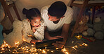 Tent, father and girl on tablet at night watching movies, online games and cartoon with fairy lights. Happy family, blanket and dad with child in bedroom on digital tech for bonding, relax and love