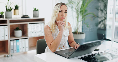 Business woman, writing and laptop for typing in office desk and online proposal for corporate. Accountant, thinking and email on financial performance for company report and document for feedback