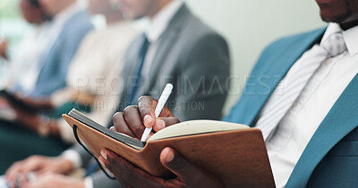 Business people, hands and meeting in row with book for notes, presentation or waiting room at the office. Closeup of businessman or employee reading notebook in line for knowledge at the workplace