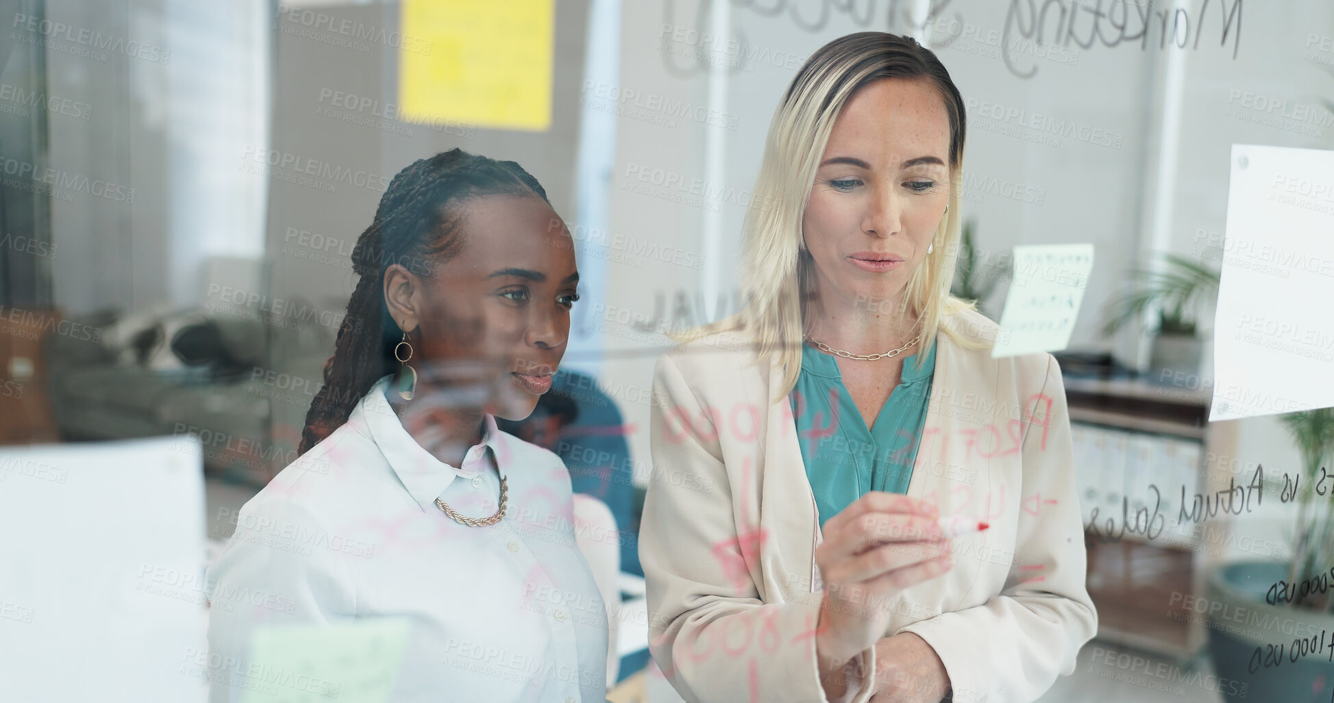 Buy stock photo Business women, planning and notes with discussion at board for creative job and work. Collaboration, teamwork and communication with project management together in a office with copywriter staff