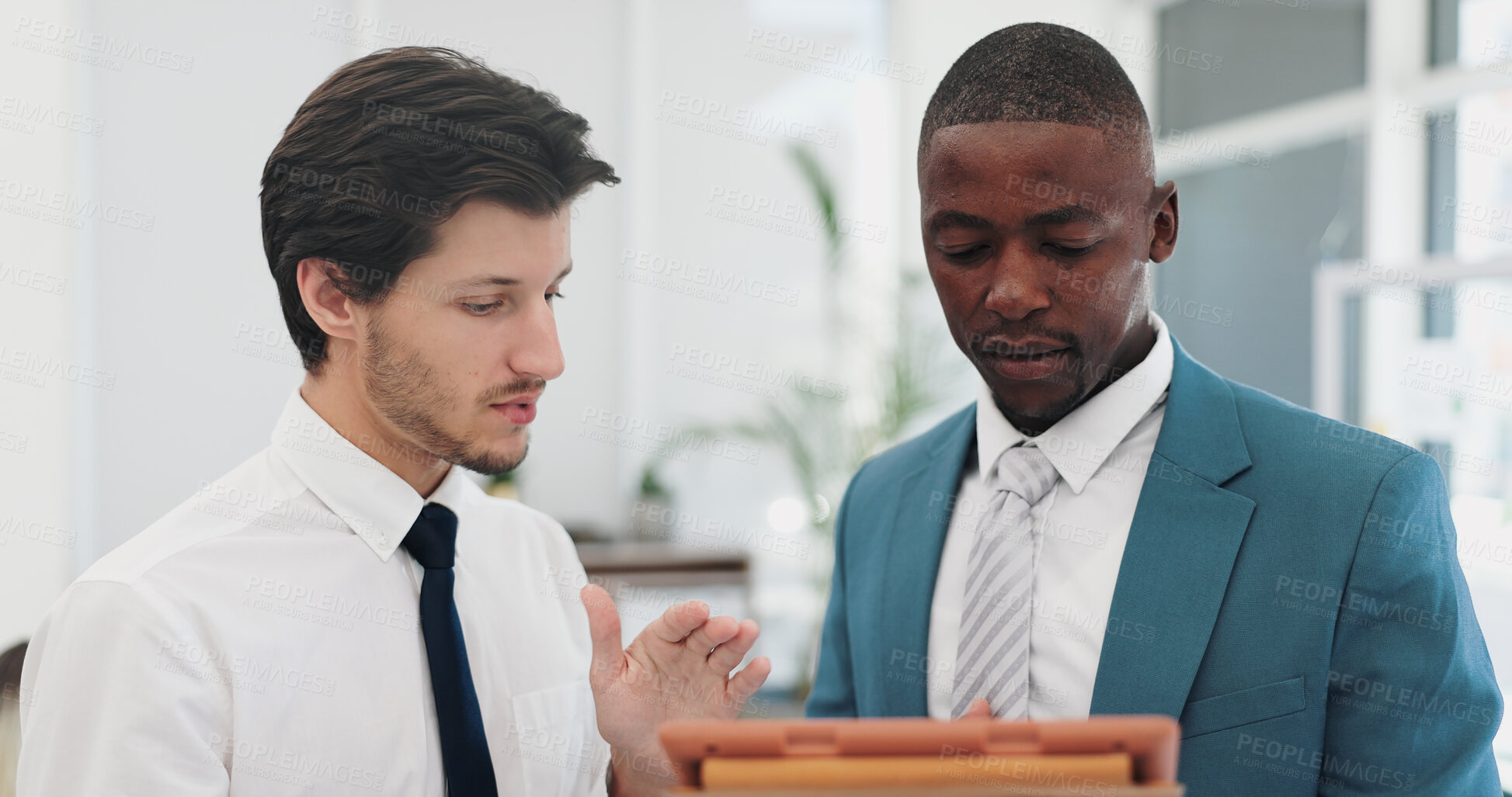 Buy stock photo Businessman, team and meeting with tablet for planning, research or coaching at the office. Man or employees in discussion or project plan with technology for communication or networking at workplace