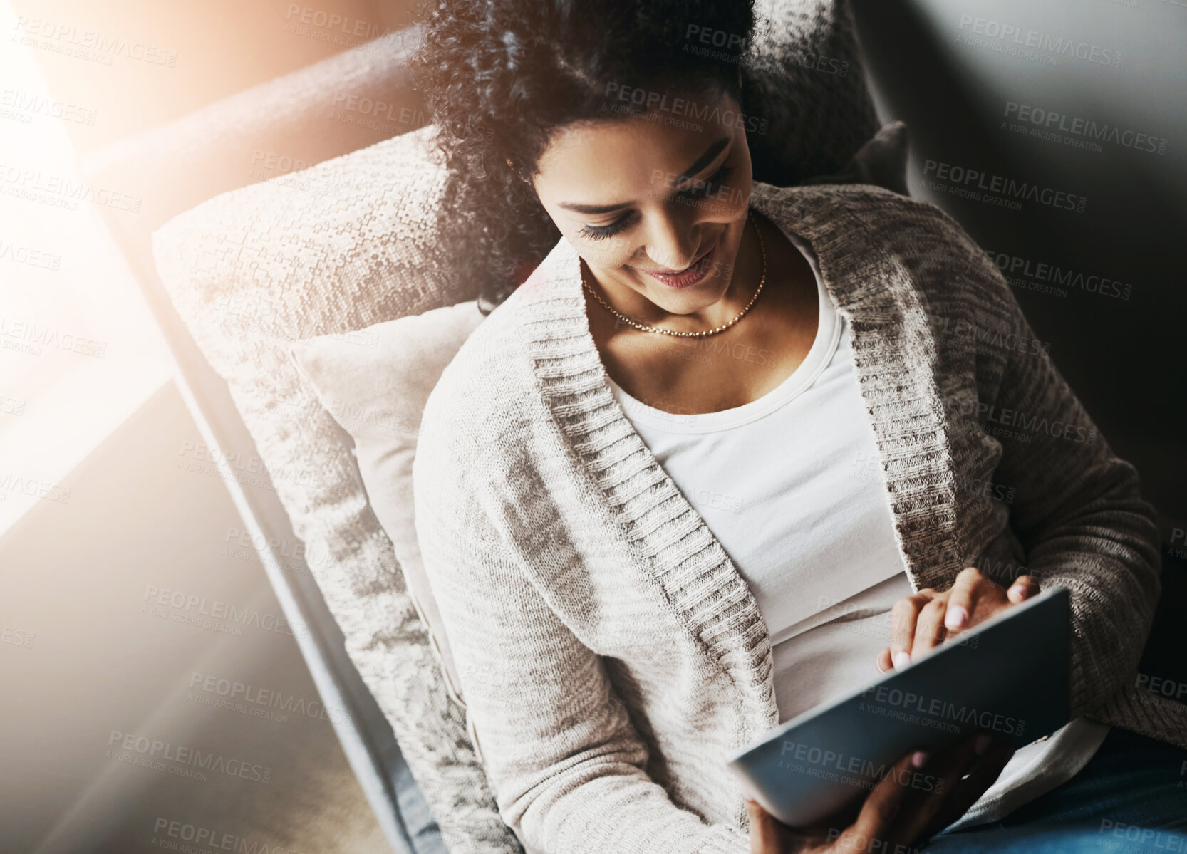 Buy stock photo Woman, relax and tablet on couch for ebook, internet and social media on weekend in home. Technology, mobile app and happy female person on sofa for reading, blog and website or news in living room 