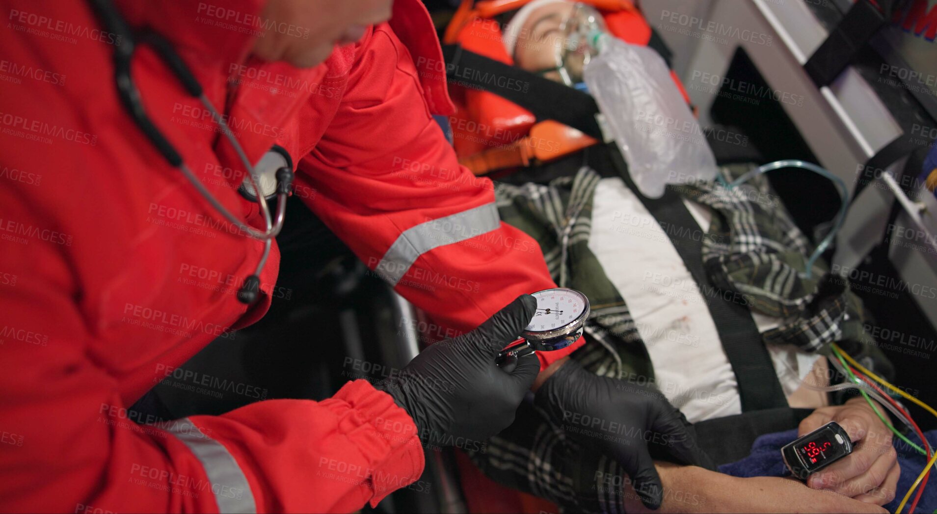Buy stock photo Watch, pulse and hands of a paramedic with a patient in an ambulance for rescue during an emergency or accident. Heartbeat, time and service with an emt closeup in a vehicle to save a man from above
