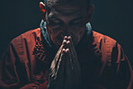 Hands, praying and man with hope for religion by black background with faith, guidance and gratitude. Christian, blessing and person with spiritual, trust or worship for belief and growth with prayer