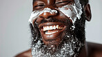 Beard, shaving and face of black man, smile and grooming for self care or beauty. Closeup or facial hair removal and hygiene or maintenance for male person, product and shave foam for skincare or spa