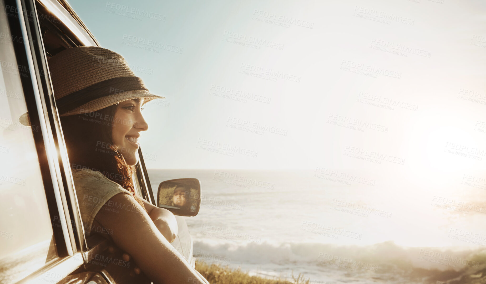 Buy stock photo Happy girl, window and beach with sunset in car for road trip, adventure or freedom on outdoor journey. Young female person enjoying break, summer vacation or travel for view or drive by ocean coast