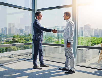 Buy stock photo Handshake, meeting and business men with introduction for thank you, welcome or greeting in office. Lens flare, commercial realtor and client shaking hands for agreement, b2b deal or acquisition