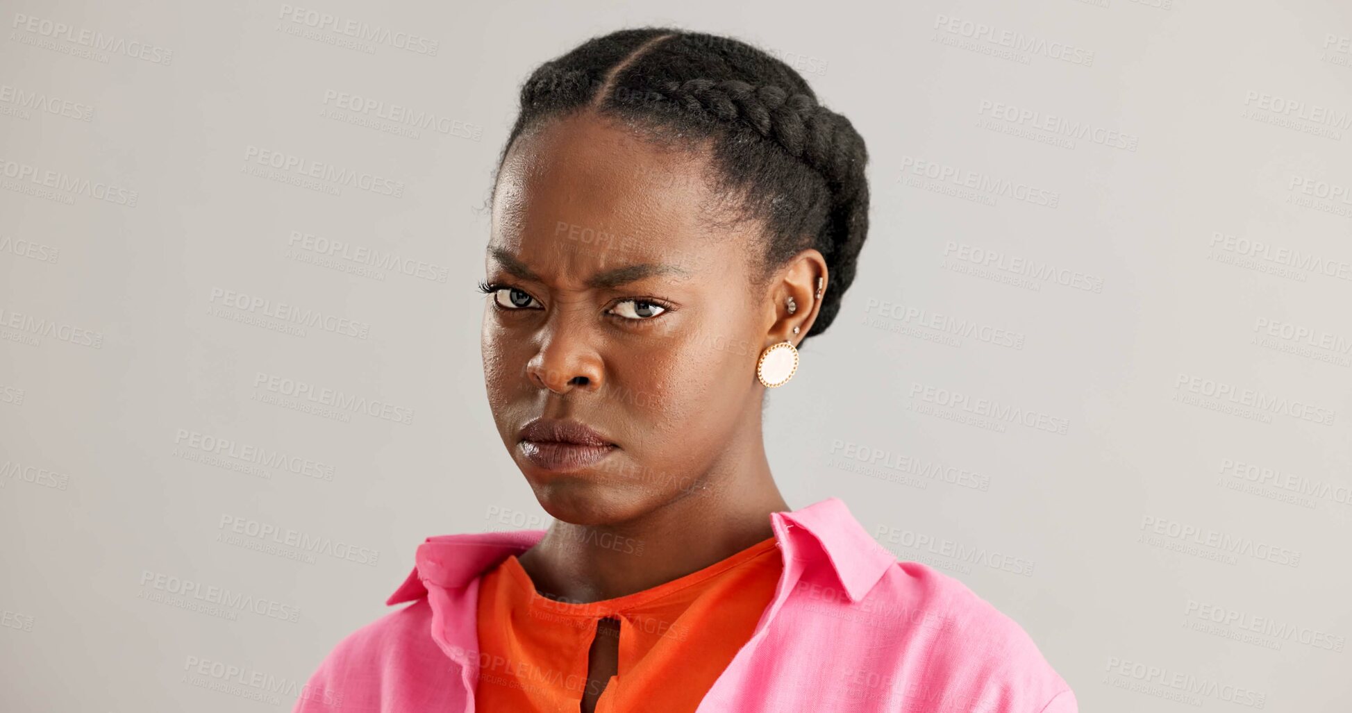 Buy stock photo Studio, portrait and black woman with emotion for anger, surprise and playful tongue out on grey background. African person, different expression and face with emoji for news, secret and confused