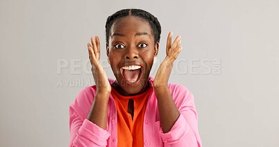 Buy stock photo Excited, black woman and surprise with good news for winning, celebration or prize on a gray studio background. Portrait of African female person with smile for lucky draw or lottery on mockup space