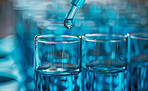 Closeup, dropper and test tube with drug, development and laboratory research for medicine or healthcare. Glass, science and discovery for life extension, biotechnology and pharmaceutical chemistry