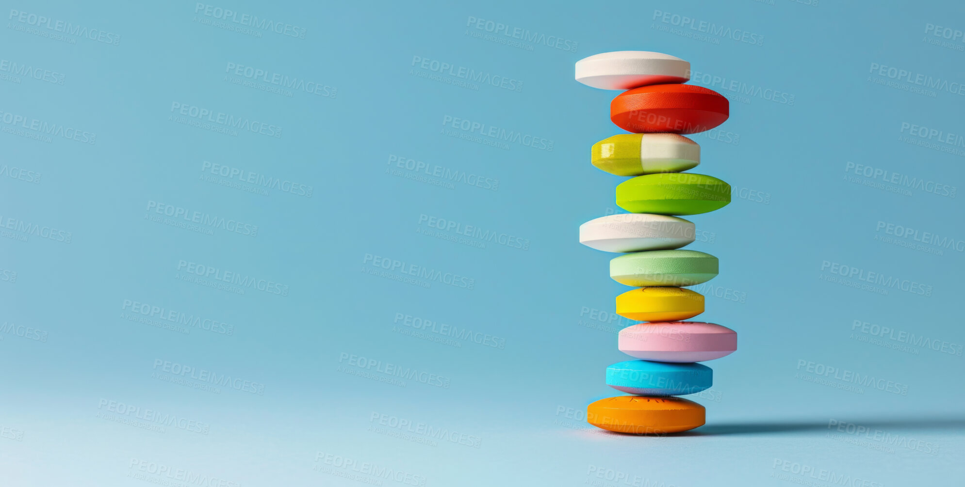 Buy stock photo Medication, healthcare and stack of pills in studio for life extension drugs, healing or recovery. Color, medical and line of tablets or medicine for weightloss by blue background with mockup space.