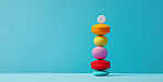 Medication, medical and stack of pills in studio for life extension drugs, healing or recovery. Color, healthcare and line of tablets or medicine for weightloss by blue background with mockup space.