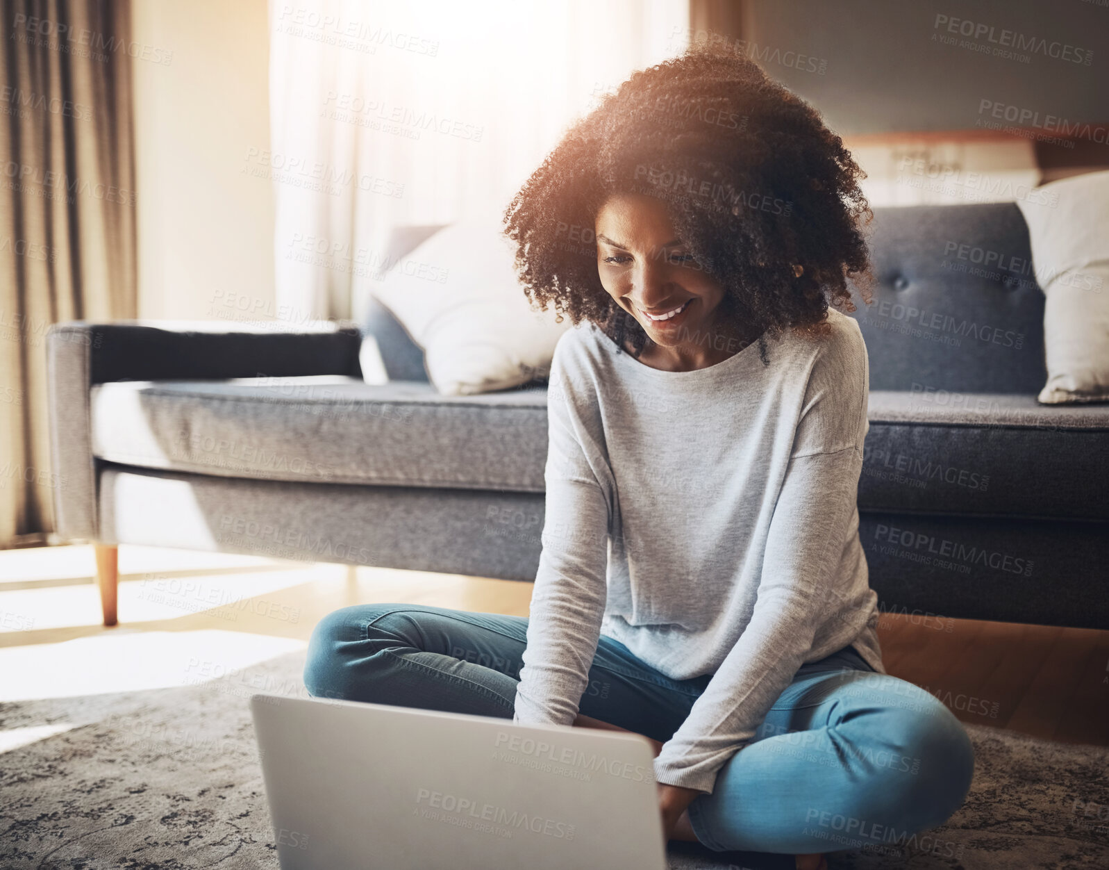 Buy stock photo Reading, laptop and black woman with smile, living room and happy for email with job offer, floor and house. Lounge, computer and person in home with opportunity of social media manager and online