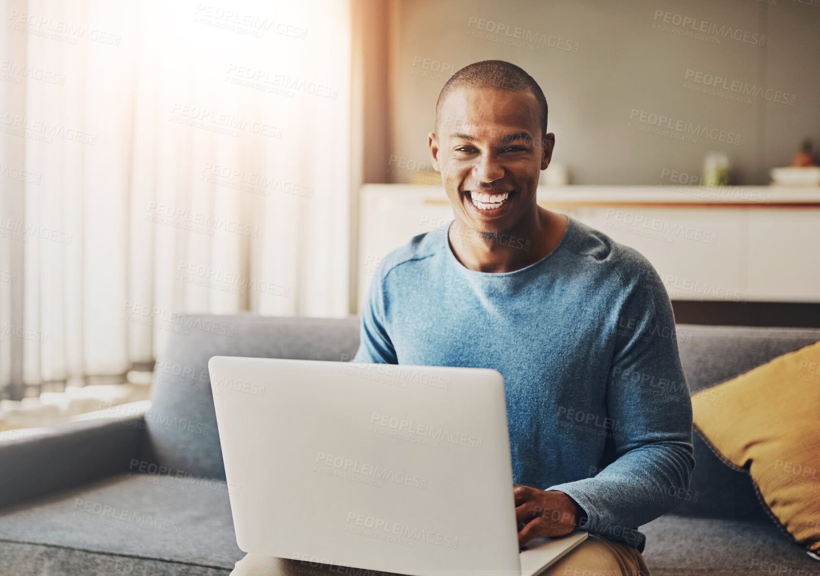 Buy stock photo Portrait, laptop and black man with smile, lounge and happy for email with job offer, couch and house. Living room, computer and person in home with opportunity of social media manager and online