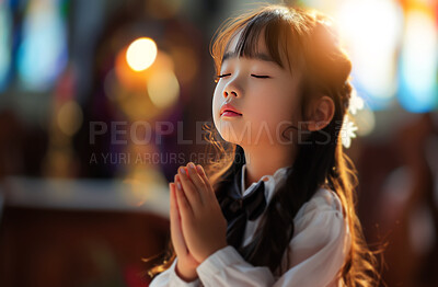Buy stock photo Temple, girl and praying with faith, religion and peaceful with sunshine and Buddhism with gratitude. Kid, hope and child with trust, help or spiritual with sunlight, China or compassion with support