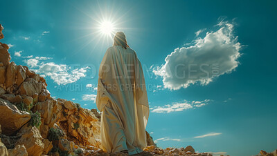 Christianity, sunrise and man on mountain as Jesus for religion, spiritual teaching and bible story. Messiah, prophet and back of person walking with blue sky for faith, belief and worship with God