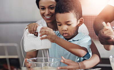 Buy stock photo Mother, child and baking with whisk machine for bonding, family time or help in kitchen at home. Mom, son or little boy preparing cookies, dough or mixture together with ingredients in bowl for snack