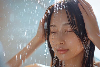Asian woman, face and relax in shower with water for cleaning, washing and hygiene routine in bathroom. Person, splash and hair care for wellness, grooming and skincare with facial cleanse and fresh