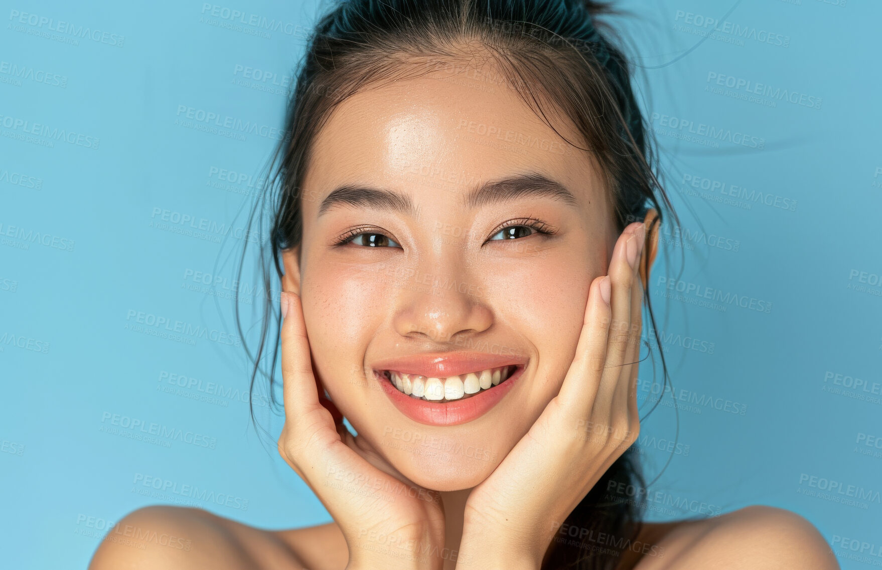 Buy stock photo Asian, woman and hands on face for beauty, skincare glow and dermatology on blue background. Healthy skin, antiaging treatment or facial wellness, natural cosmetics and clean look makeup in portrait