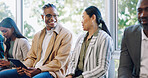 Networking, tablet and business people with a handshake at a seminar, meeting and discussion. Smile, office and employees shaking hands with technology and speaking while waiting for an interview