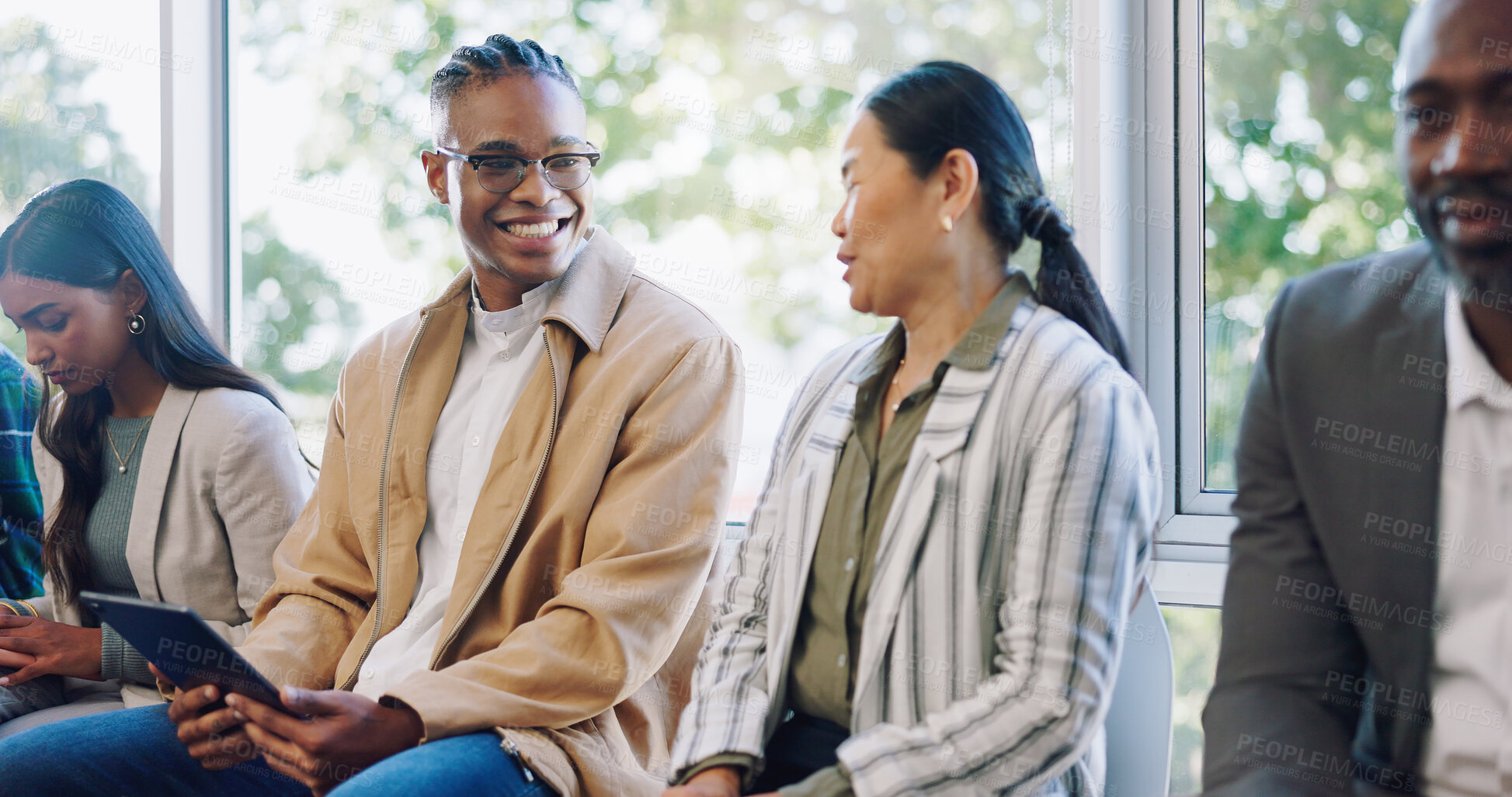 Buy stock photo Networking, tablet and business people with a handshake at a seminar, meeting and discussion. Smile, office and employees shaking hands with technology and speaking while waiting for an interview