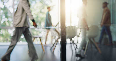 Buy stock photo Blurred background, business people and flare with walking in office boardroom for meeting or planning. Corporate, training or workshop with  employee group in professional workplace together