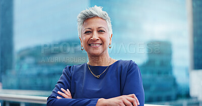 Crossed arms, business and face of senior woman with confidence, pride and happy on office balcony. Corporate manager, professional worker and portrait of person for career ambition, working and job
