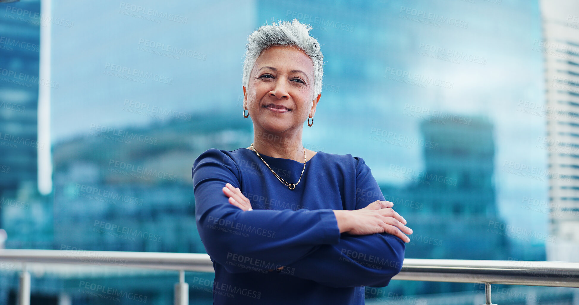 Buy stock photo Crossed arms, business and face of senior woman with confidence, pride and happy on office balcony. Corporate manager, professional worker and portrait of person for career ambition, working and job