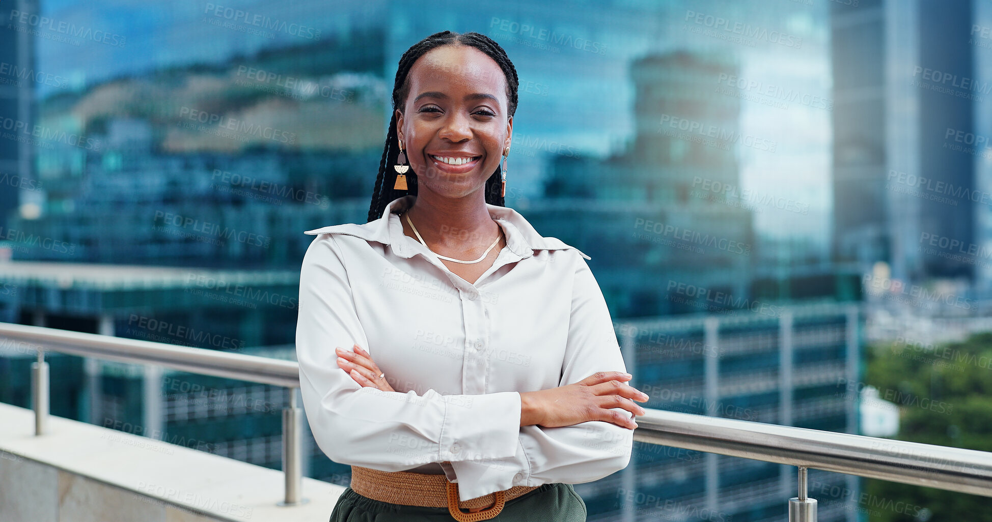 Buy stock photo Black woman, face and arms crossed, lawyer happy with career and confident on rooftop, skyscraper and pride. Expert, legal employee or attorney with smile in portrait for corporate and professional