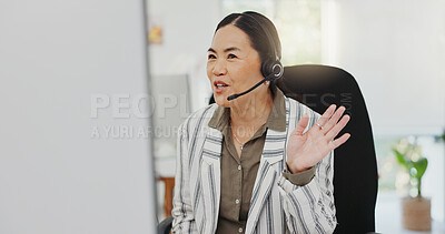 Asian woman, call center and wave in virtual meeting, discussion or customer service at the office. Friendly female person, consultant or agent talking on computer in hello for webinar at workplace