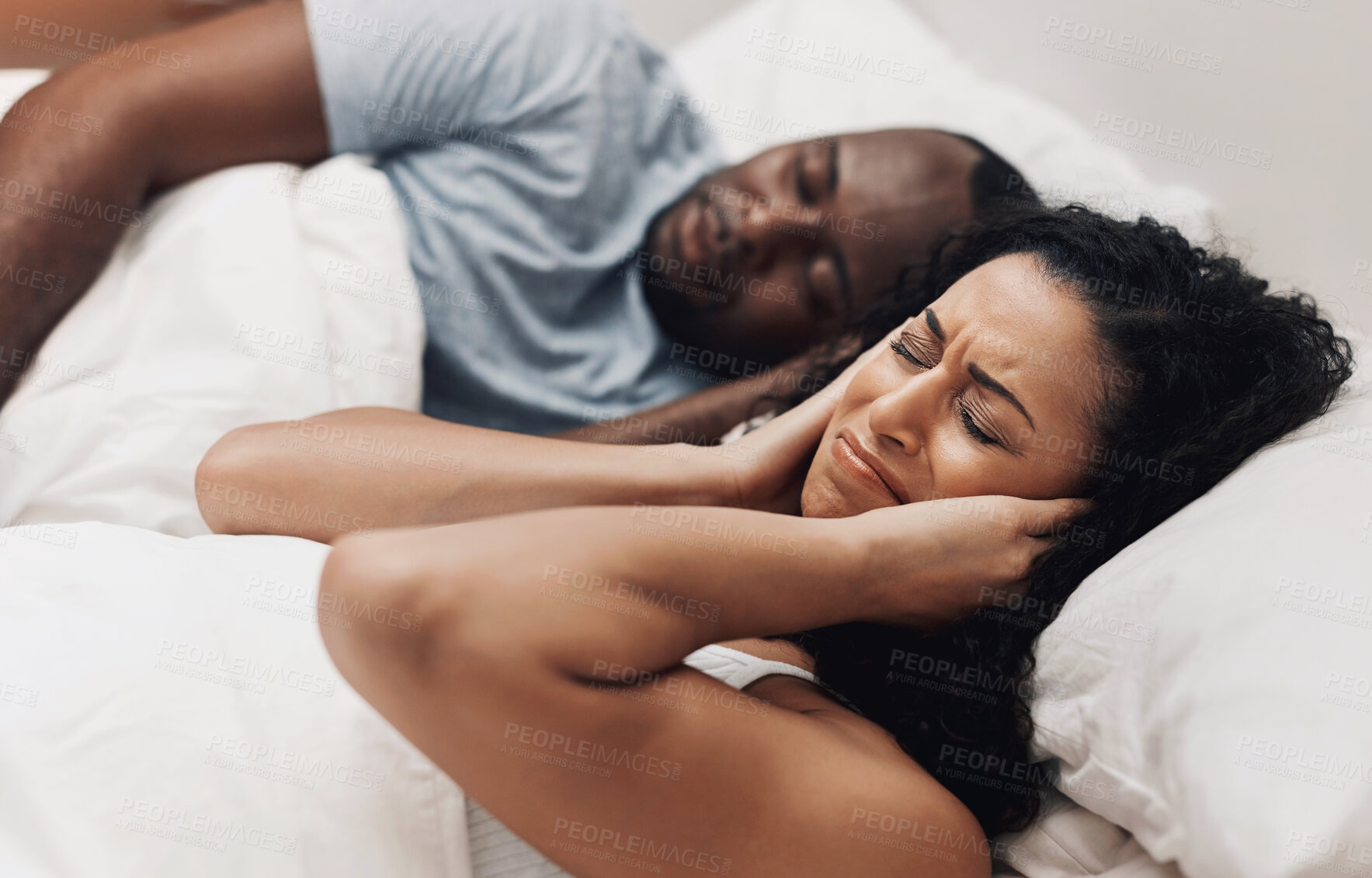 Buy stock photo Angry, snoring and couple in bed with sleep apnea frustrated by husband with noise, problem and upset woman. Exhausted, cover ears and tired man asleep with fatigue, sinus allergy and burnout in home