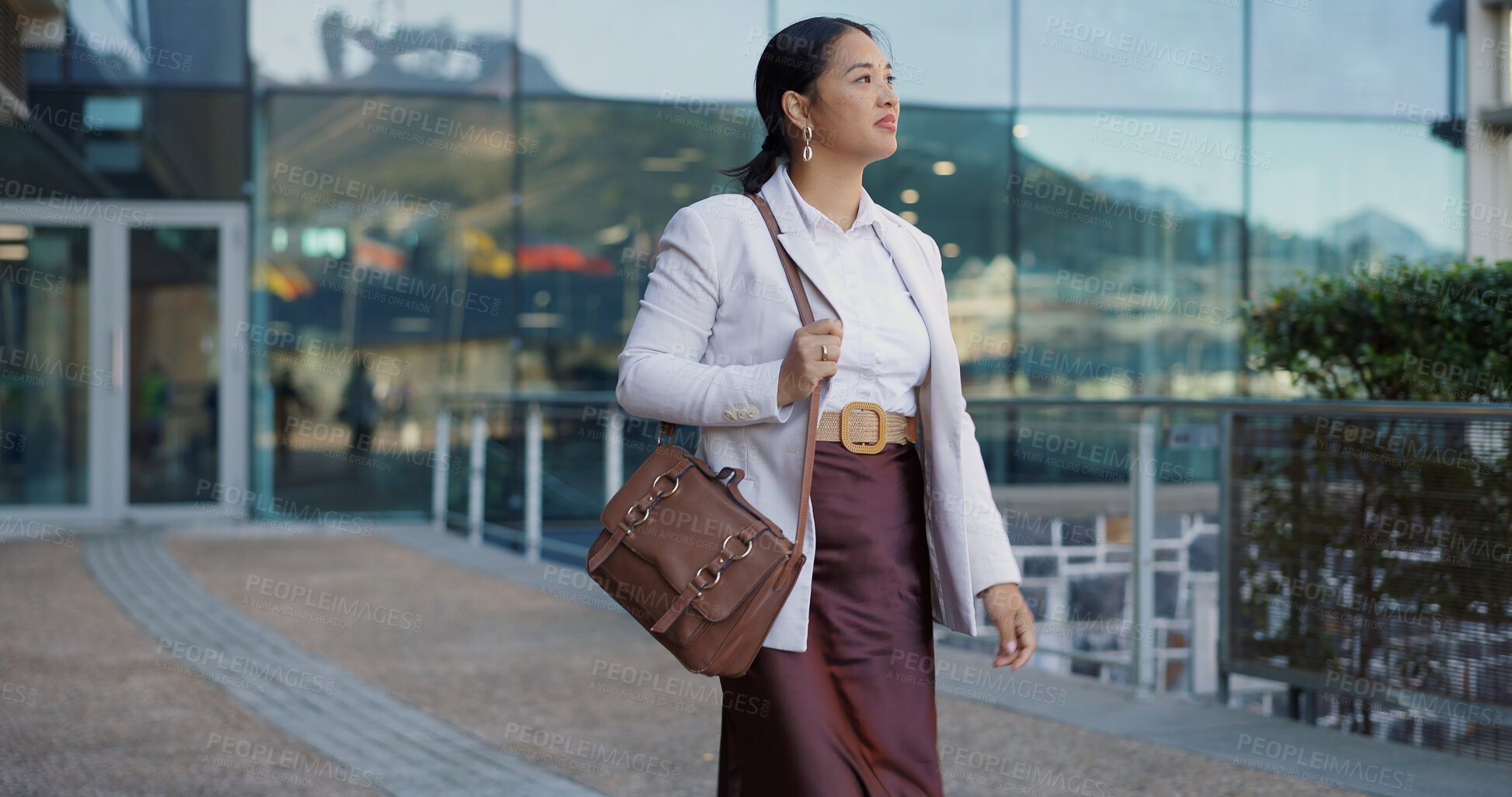 Buy stock photo Japanese business woman, walking and street by office buildings with thinking, direction and bag in city. Person, outdoor and search for location with idea, memory or vision for career on metro road