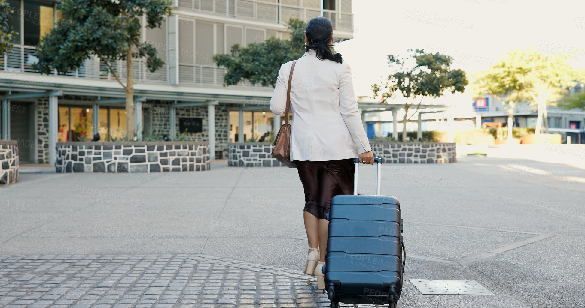 Buy stock photo Business woman, luggage and walking in city for travel opportunity, immigration or career trip. Back of professional person or entrepreneur with suitcase for airport, hotel or journey to location