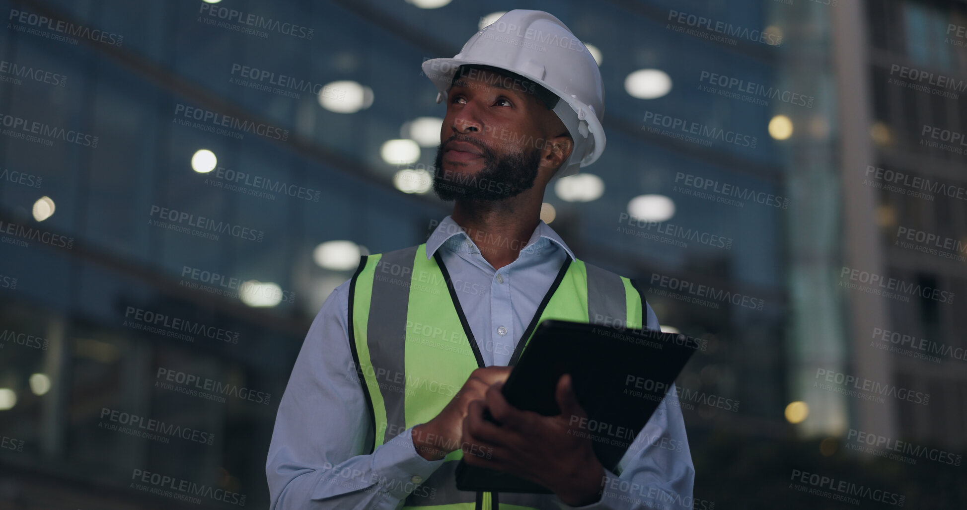 Buy stock photo Black man, engineer and thinking at building with tablet for online inspection or safety protocol, architecture or city. Male person, hardhat and project management or construction, internet or night