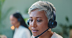 Call center, communication or senior woman in office consulting for faq, contact us or customer support. Telemarketing, help or old female consultant with telecom, questions and crm, sales or service