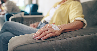 Healthcare, hands and senior woman with iv drip in a hospital for cancer, treatment or chemotherapy. Catheter, fluid and elderly female patient at a wellness clinic for kidney dialysis treatment
