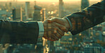 Business people, handshake and meeting in city for global deal, partnership and partnership in New York. Corporate clients or worker shaking hands with travel opportunity, negotiation and job success