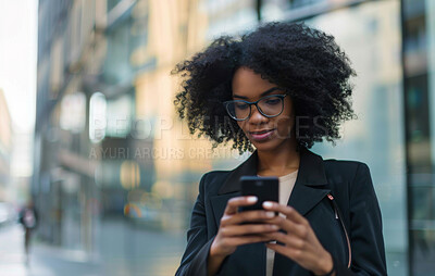 Texting, walking and black woman in city with phone for networking, communication and morning commute. Typing, online search and girl on sidewalk checking smartphone, mobile app and urban connection.