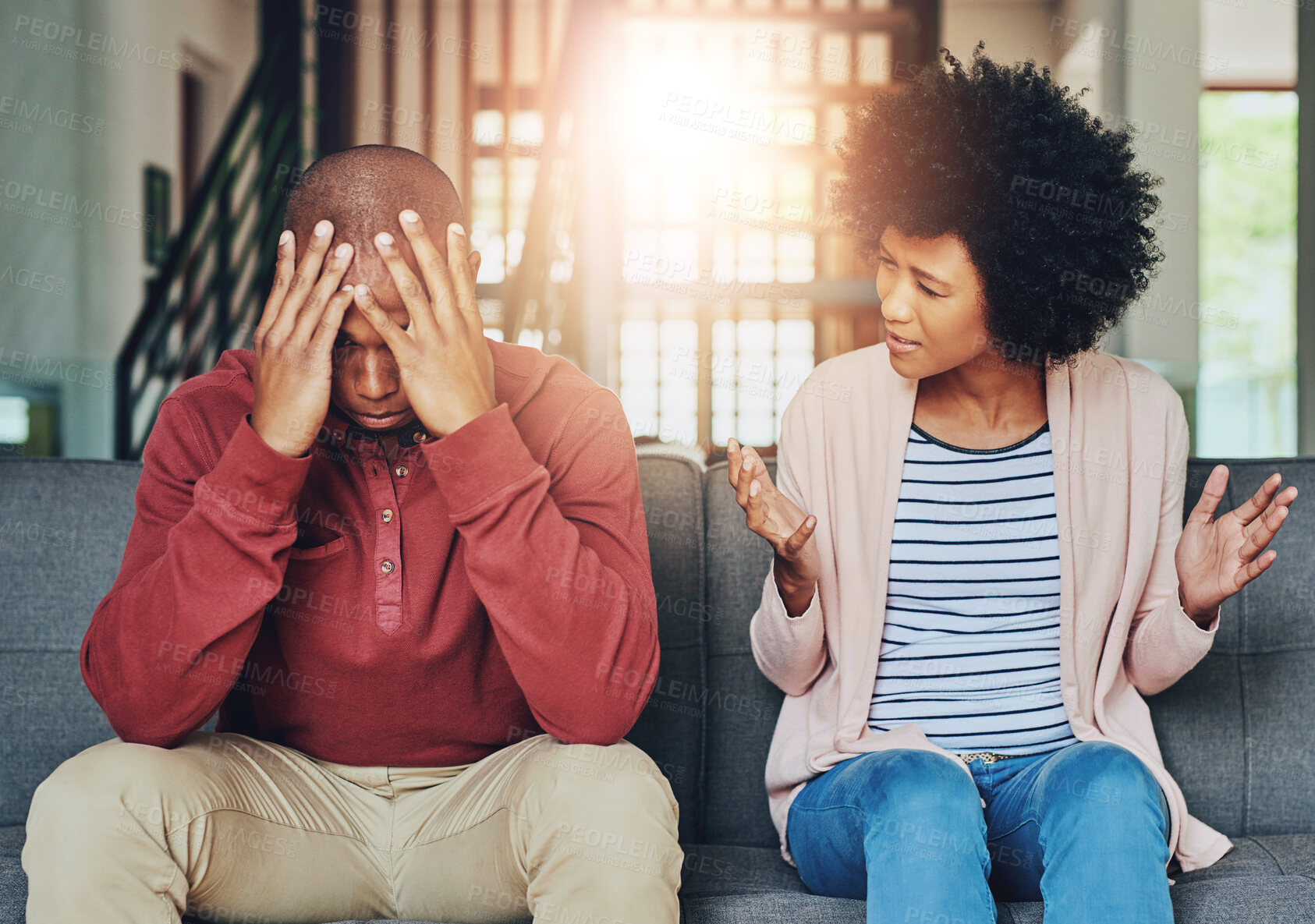 Buy stock photo Man, woman and argument with fight on sofa with depression, headache and frustrated for divorce in home. African couple, angry and conversation with questions, conflict and cheating in house