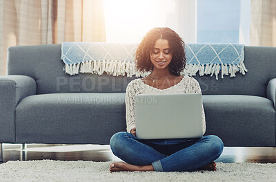 Buy stock photo Remote work, laptop and happy woman in home living room for reading email, writing blog or typing. Freelancer, computer and person in lounge to relax on social media, article and news on internet