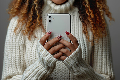 Hands, mirror selfie and studio for social media post, profile picture and image memory of person. Woman, photography and taking photo by gray background with sweater, casual jumper or fashion
