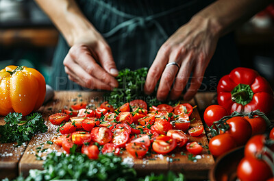 Person, hands and chef with vegetables or cooking health meal in home kitchen with tomato, nutrition or pepper. Fingers, wooden board and prepare healthy food at counter or hungry, ingredient or diet