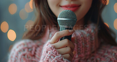 Woman, bokeh and closeup microphone for music recording, singer and speech in studio. Female artist, rap and performance with sound, audio and voice for concert, karaoke and broadcast event on stage