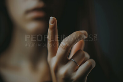 Hand, closeup and woman with point at you woman with choice, warning and invitation in dark house. Girl, person and show index finger for decision, symbol or emoji for selection in night at apartment