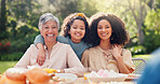 Family, hug and face at birthday party on table outdoor with mother, child and grandma with smile. Summer, event and celebration with love, support and girl in garden with generation of women or mother's day