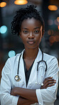 Black woman, portrait and healthcare doctor with arms crossed, stethoscope or cardiology. Female person, medical professional and confidence on night shift for patient trust, disease or hypertension